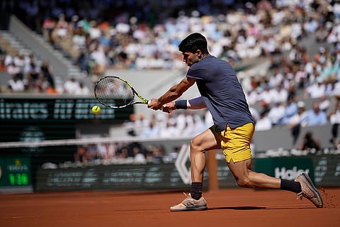 Spain's Carlos Alcaraz plays against Italy's Jannik Sinner